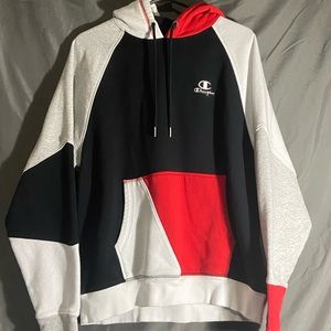 multicoloured champion sweater in the size medium